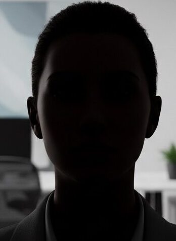 A silhouetted professional stands in the foreground with a modern, out-of-focus office in the background.
